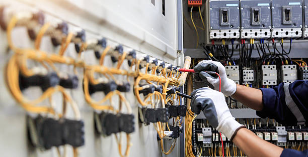 Professional Electrician technician working in Portland, IN